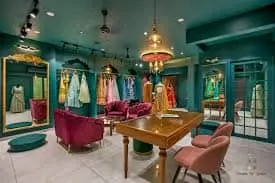 This is the image of home based fashion boutique where different type of clothes are placed. 