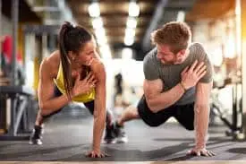 This is the image of a man and women where they are practicing in a fitness centre . meditatioin centre 
this is the best small business ideas for women.